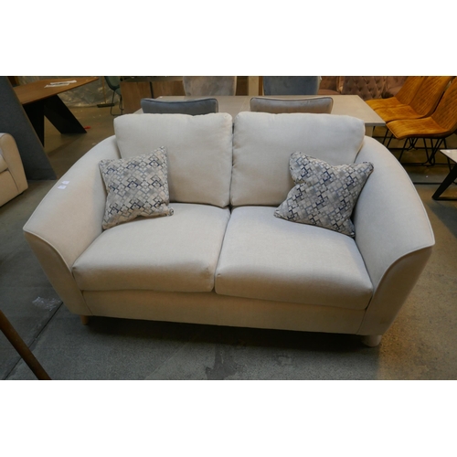 1526 - A light grey upholstered two seater sofa