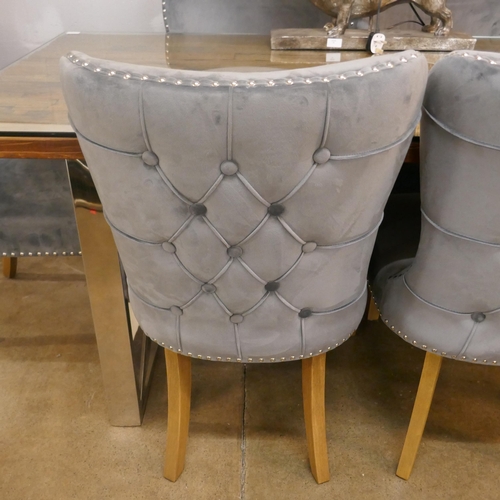 1315 - A Chennai 180cm dining table and a set of six grey velvet buttoned  dining chairs * this lot is subj... 