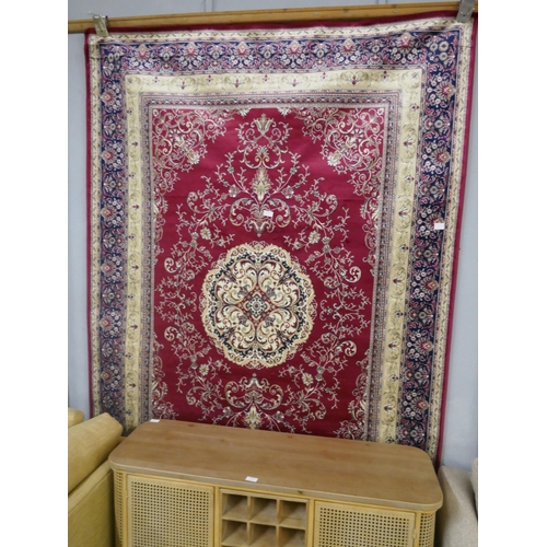 1355 - A red ground Keshan rug, 230 x 160