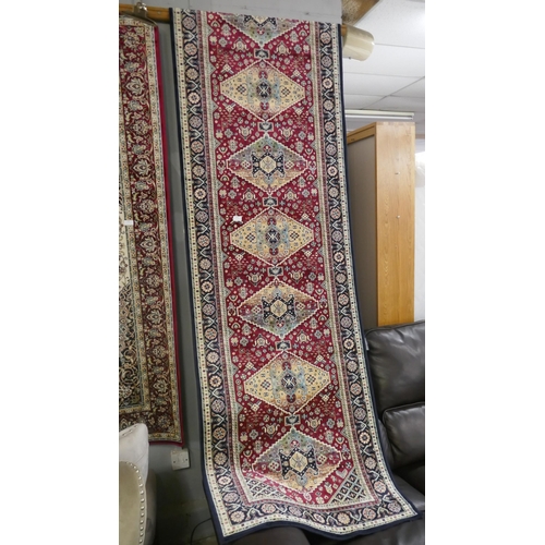 1363 - A blue ground medallion design Royal Palace runner 400cm