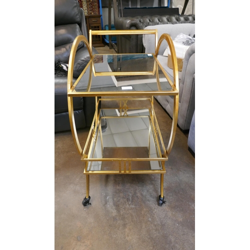 1428 - A gold Art Deco style drinks trolley