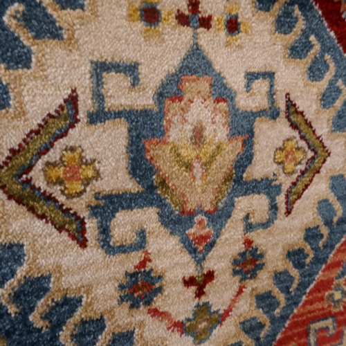 1485 - A blue full pile rug with all over medallion design, 230 x 160