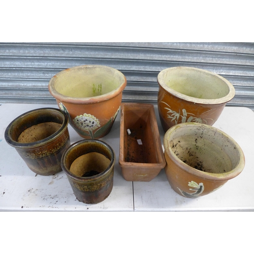 2229 - 15 Assorted terracotta and glazed planters and two cowlings