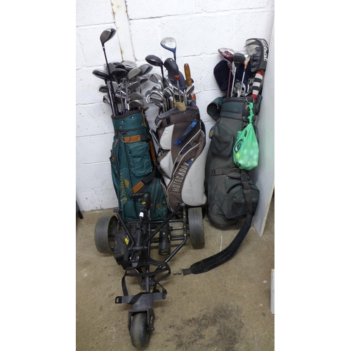 2278 - Three bags of golf clubs including Dunlop Tour and Wilson Top Elite and a Powercaddy golf cart with ... 