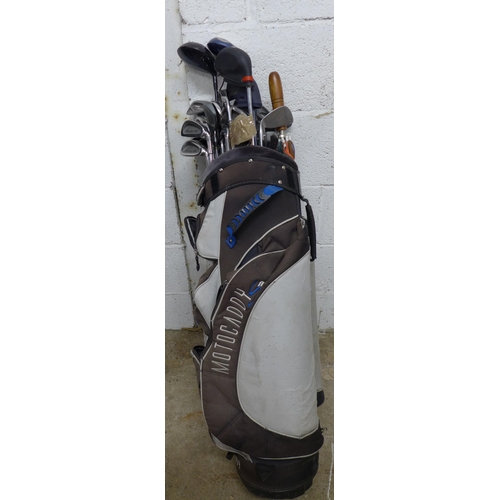 2278 - Three bags of golf clubs including Dunlop Tour and Wilson Top Elite and a Powercaddy golf cart with ... 