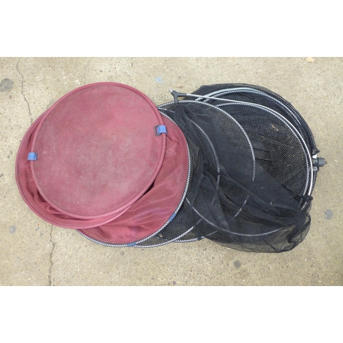 2284 - A quantity of fishing equipment including a Team Diawa fishing box containing various reels, bait bo... 