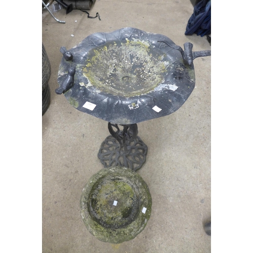 2287 - A concrete ornamental planter and cast metal bird bath