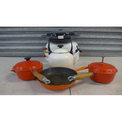 2314 - A quantity of cast iron crockery and cookware including Lavec saucepans, Crofton shallow casserole d... 