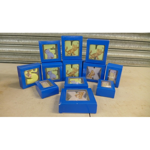 2324 - A box of 47 ceramic Disney character letters including Winnie The Pooh