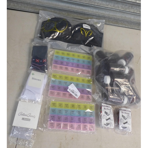 2325 - A box of 40 items including pill bottles, bras, socks, belts and medication organisers