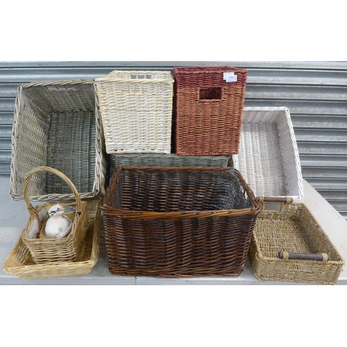 2334 - Nine assorted wicker baskets in an assortment of colours, styles and sizes