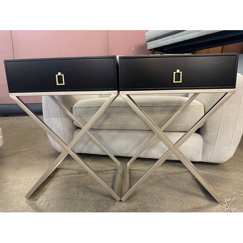 1535 - A pair of black bedside tables with silver crossed legs