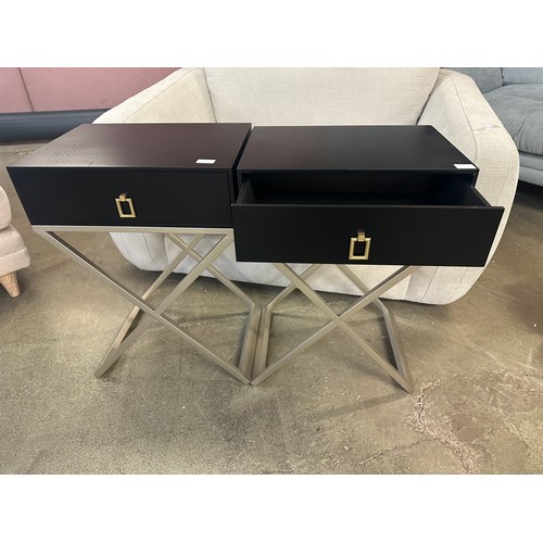 1535 - A pair of black bedside tables with silver crossed legs