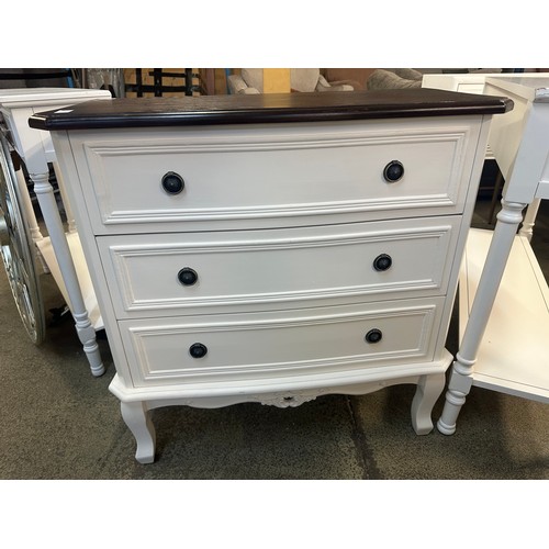 1537 - A white three drawer chest with contrast top