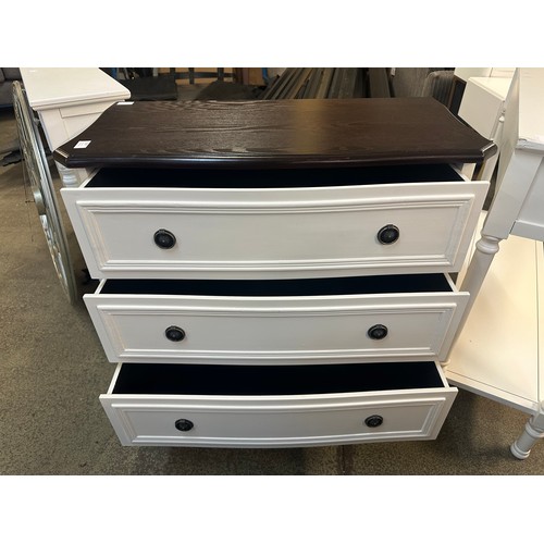 1537 - A white three drawer chest with contrast top