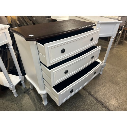 1537 - A white three drawer chest with contrast top