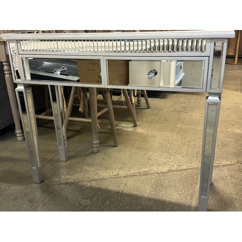 1540 - A silver mirrored two drawer console table