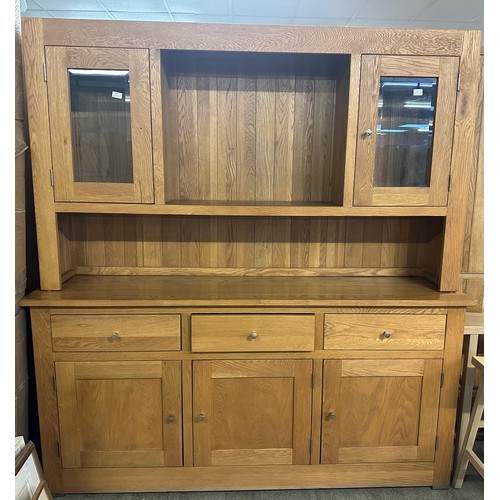 1554 - A large oak glazed dresser