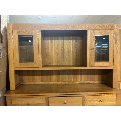 1554 - A large oak glazed dresser