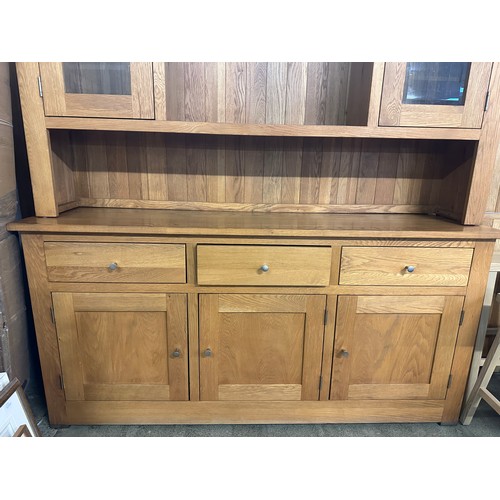 1554 - A large oak glazed dresser