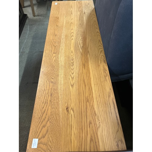 1583 - A large oak TV stand