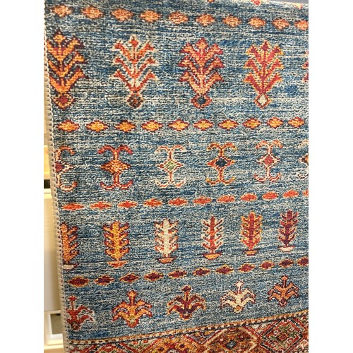 1590 - A multi coloured rug, 120 x 170cm