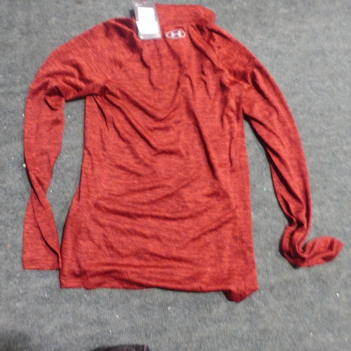 3206 - Small bag of eight women's Under Armour ½ zip Tech tops (mixed sized) * this lot is subject to VAT