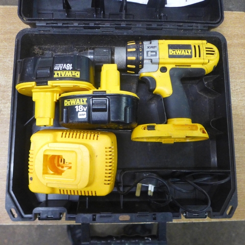 2032 - A Dewalt DC925 18v cordless power drill with case, two 18v batteries and battery charger