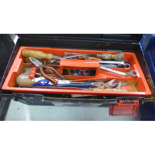 2056 - A metal cantilever tool box and a plastic Keter tool box containing spanners, slating hammer, rasp, ... 