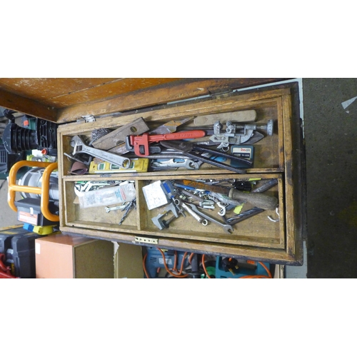 2057 - A carpenter's tool chest of woodworking tools and other tools including tin snips, spanners, drill b... 