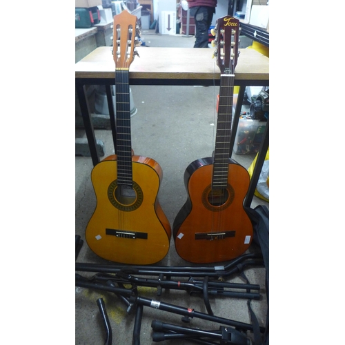 2064 - Two acoustic guitars - Torre 4436 and Herald HL34, both with cases and 5 assorted music stands