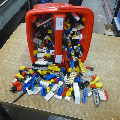 2086 - A Lego storage container full of assorted Lego building bricks