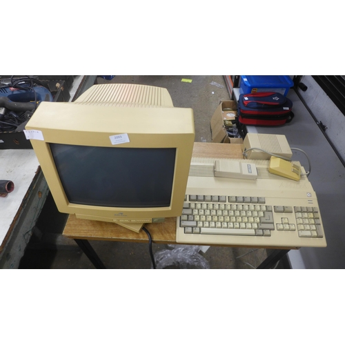 2093 - A Commodore Amiga model 500 computer, an ADI Pro  Vista VD-645 1998 model computer monitor and an as... 