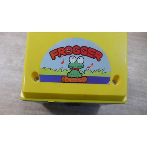 2104 - A Frogger vintage hand held battery operated arcade game