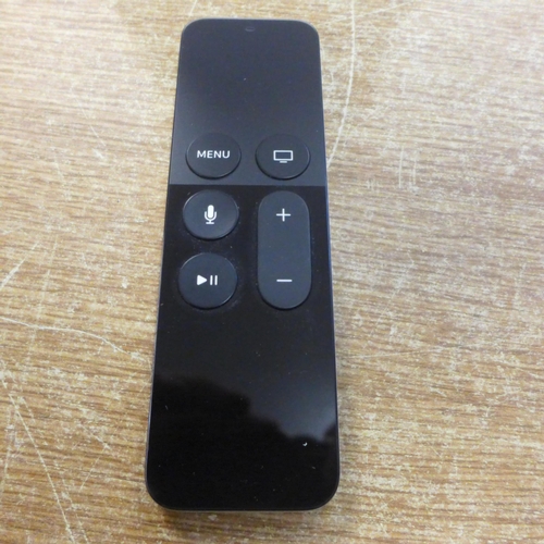 2108 - An Apple TV set top box, model A1513 and an Amazon Fire Stick LY73PR, both with remotes