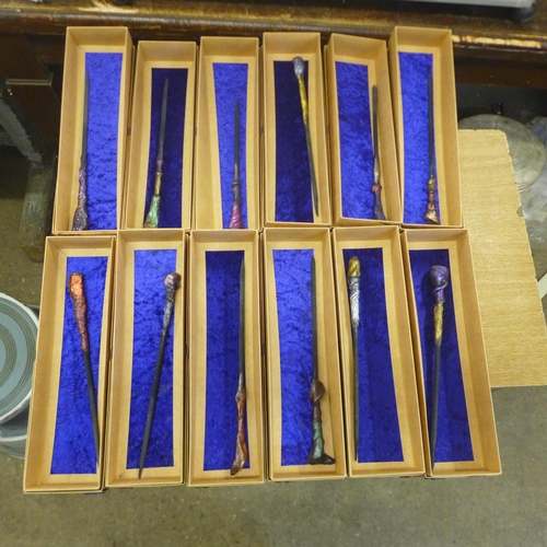 2109 - An assortment of 12 wooden carved wands