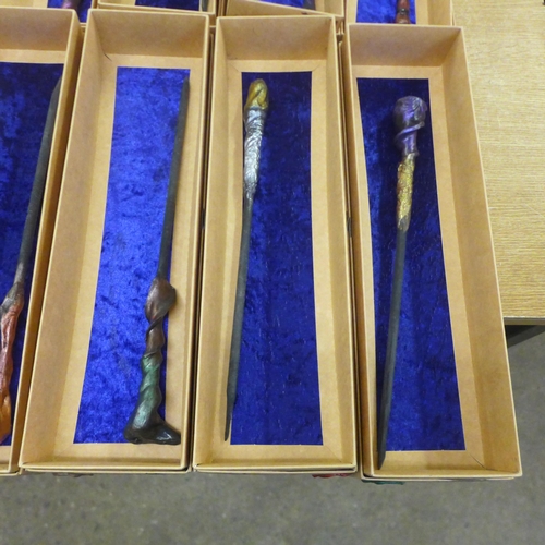 2109 - An assortment of 12 wooden carved wands