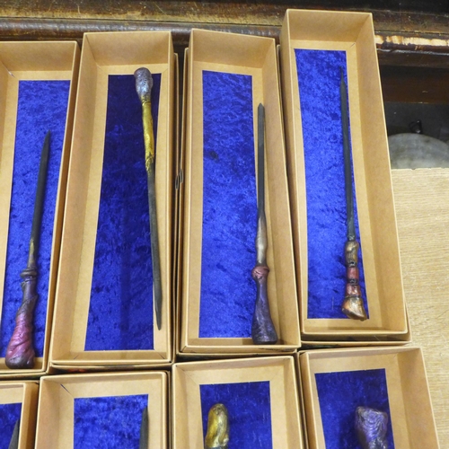 2109 - An assortment of 12 wooden carved wands