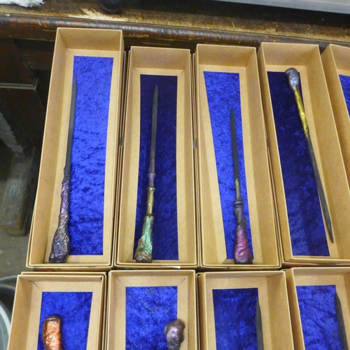 2109 - An assortment of 12 wooden carved wands