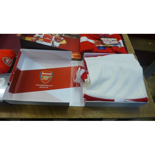 2112 - Three Arsenal football club membership gift packages including an Arsenal beanie hat, Arsenal gloves... 