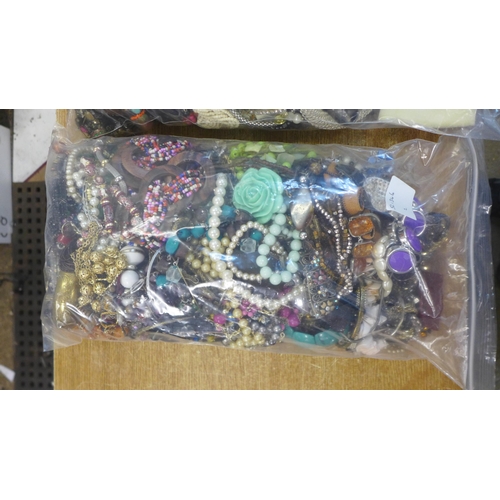 2118 - Two bags of assorted costume jewellery Approx. 5kg in total