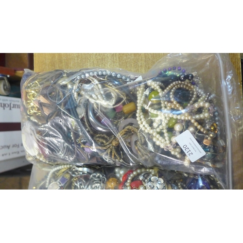 2120 - Two bags of assorted costume jewellery Approx. 5kg in total