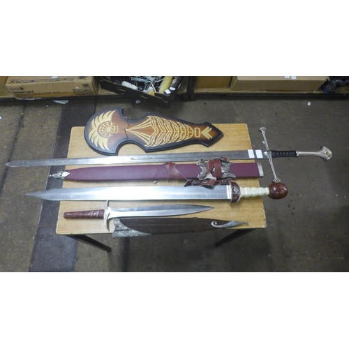 2122 - A collection of cosplay prop replica swords including Anduril sword from The Lord of the Rings, Stin... 