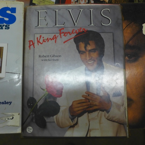 2134 - A quantity of Elvis Presley paraphernalia including books and magazines such as 'Elvis' The Official... 