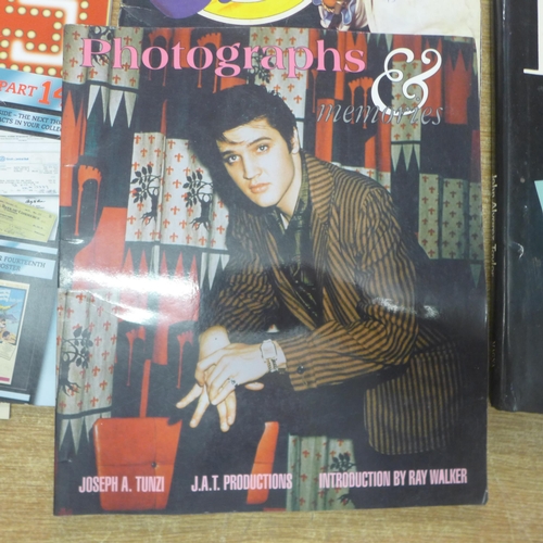 2134 - A quantity of Elvis Presley paraphernalia including books and magazines such as 'Elvis' The Official... 