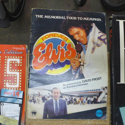 2134 - A quantity of Elvis Presley paraphernalia including books and magazines such as 'Elvis' The Official... 