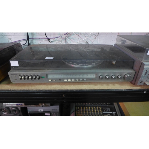 2146 - A Panasonic SG-3200 stereo music centre with belt driven automatic turntable record player and radio... 