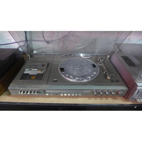 2146 - A Panasonic SG-3200 stereo music centre with belt driven automatic turntable record player and radio... 