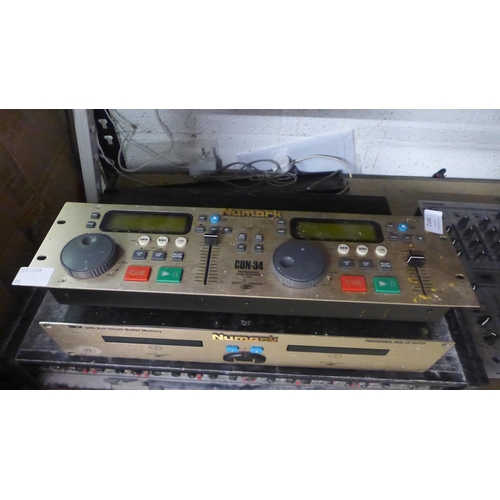 2168 - A quantity of stereo equipment including a Behinger DJX700 professional DJ mixer, a Numark CDN-34 pr... 