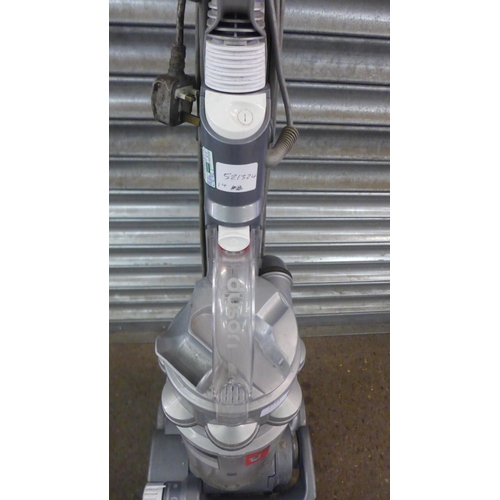 2194 - A Dyson DC14 vacuum cleaner with telescopic reach and quick release wand, expands for instant cleani... 